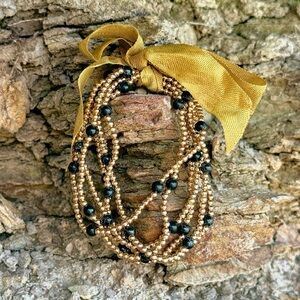 Elegant Gold and Black Beaded Bracelet